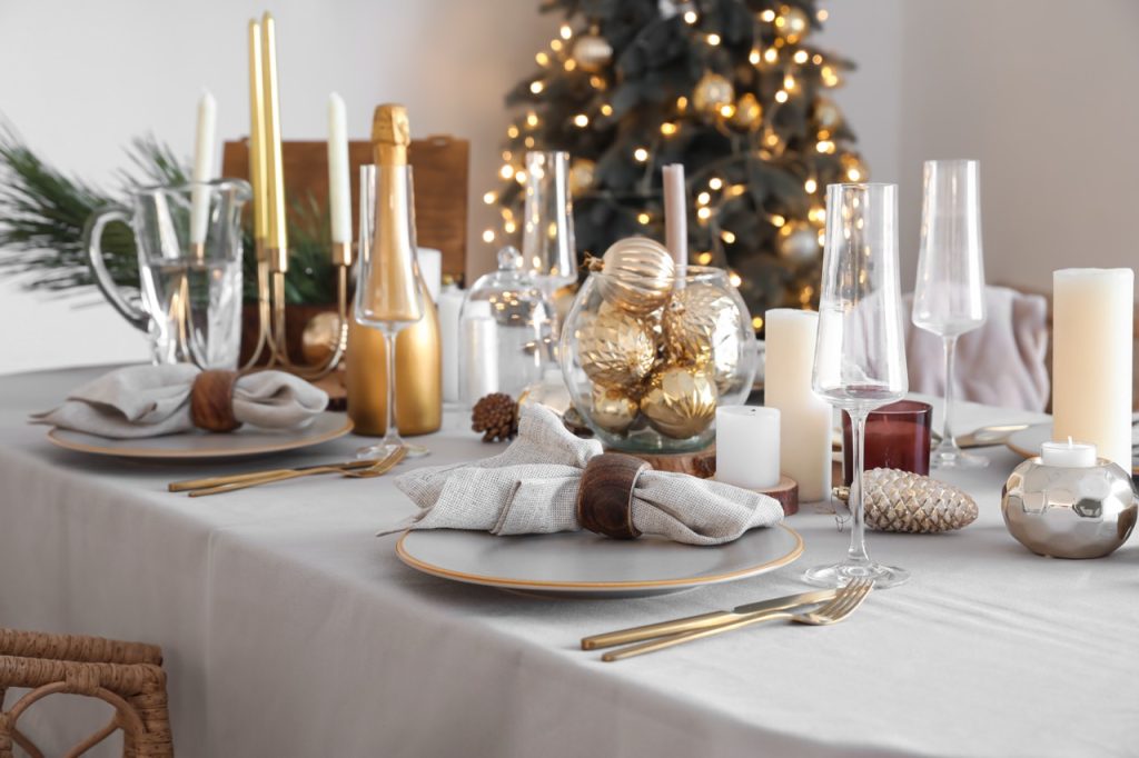 Dining table with setting for Christmas celebration indoors